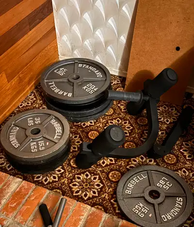 Good condition $1 per pound of weights Standard steel weights