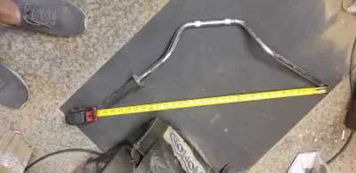 These motorcycle handle bars, measuring 30 inches in width, are ready to enhance your riding experie...