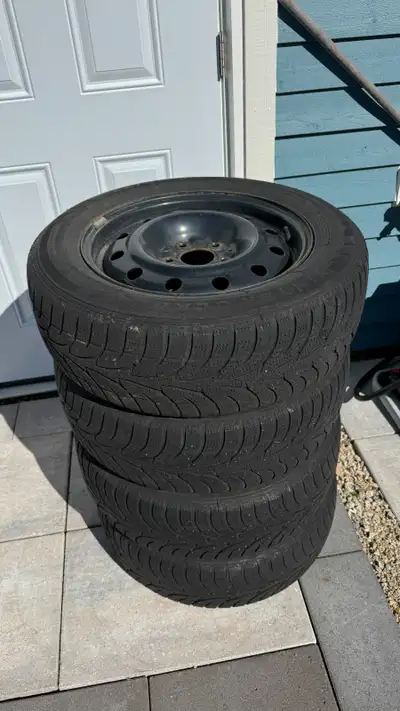 Winter tires and rims for sale... not used in 2 years. Some tread left on the tires, plenty good for...