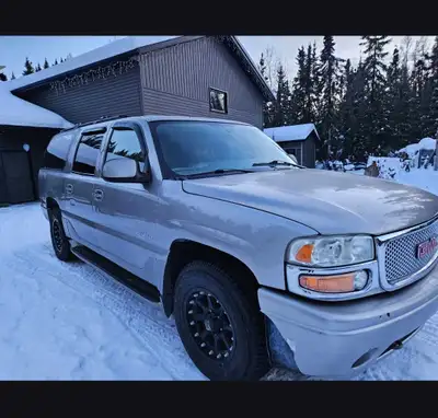 Leather interior, 3rd row seating, sun roof, bose stereo. Rusty rockers and general rust, 140,000km...