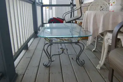 Glass coffee table with decorative stand, View more