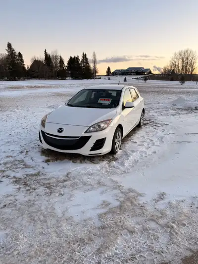 White Mazda 3 hatchback Great condition, was well kept Good on gas Year: 2010 Mileage: 144k km Trans...
