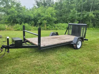 For sale is this custom flat bed utility trailer. Just built this year. Trailer has working lights,...