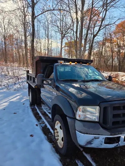 Low km 6.0 powerstroke. Pintle hinch, trailer gain, rusty dump box but body is accident/ rust free....