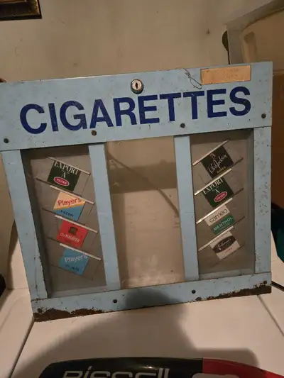 Very early cigarette vending machine door. I have 2 available. First come first served. No holds. De...