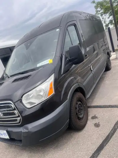 This Ford Transit is a reliable, high-capacity 12 passenger van ideal for group transport, featuring...
