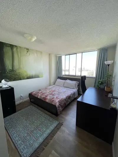 - A private room , shared bathroom and kitchen for an individual - Furnished (queen bed, large work...