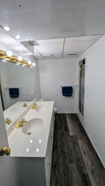 Large one bedroom basement with walk in closet/den
