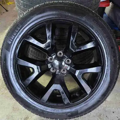Pirelli tires with 18 inch alloy rims. Rims in great shape, theyre jet black. The tires have 90% tre...
