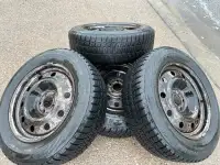 Bridgestone 215/65R17 Winter Tires on Rims (4)