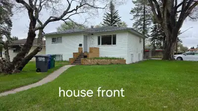 Beautiful corner-lot home featuring 7 bedrooms, 2.5 bathrooms, a huge garage, and a large backyard w...