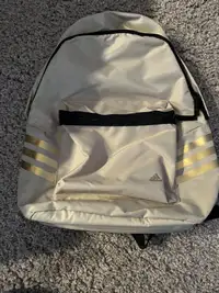 Gold and beige Adidas backpack