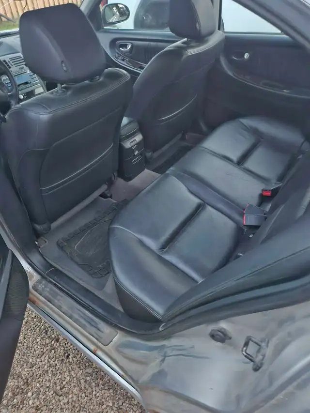 2003 Nissan Maxima 557469098731776009
