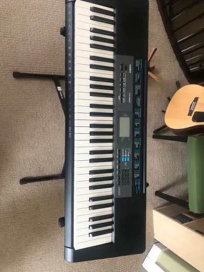 Casio keyboard, good condition, comes with adjustable stand