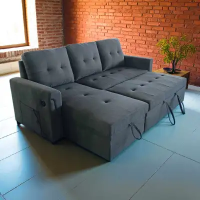 This brand new sectional sofa bed is the perfect blend of comfort and functionality, featuring a pul...