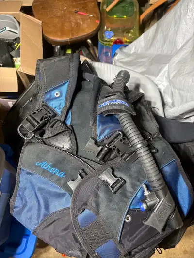 Akona 7mm wetsuit size 3XL, new: $200.00 Akona Titanium wetsuit boots size 6: $30.00 Sherwood Triton...