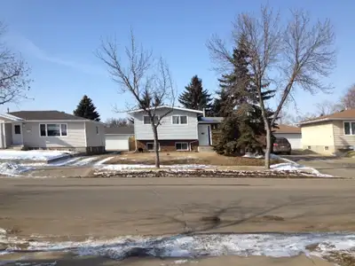 Spacious 4 Level Split with 3+1 bedrooms, living room, dining room, family room, computer room, 2 ba...