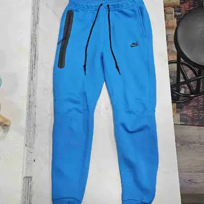 Blue Nike Tech pants Men's Medium, View more