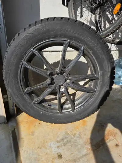 Bridgstone Blizzak DMV2 Winter Tires - Used 1 Season with low mileage. Size 255 55 R19 . These tires...