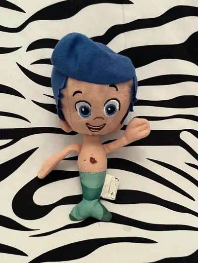 Bubble Guppies Gil Plush Toy Approximately 8 inches tall Machine washed and dried Comes from a smoke...
