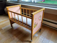 Antique doll crib and doll crib bedding