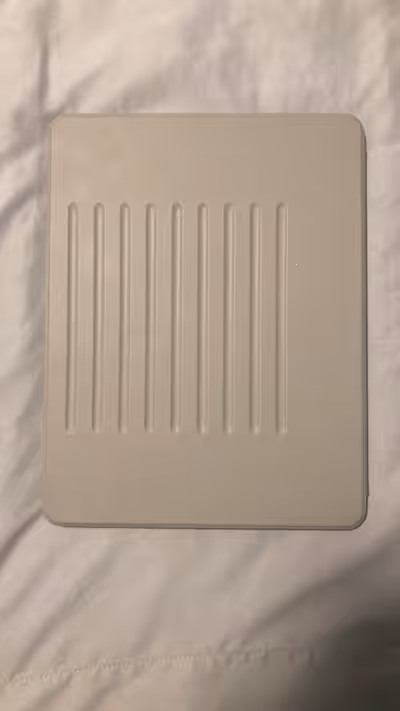 Light grey 12.9” ESR iPad Pro (M2) Magnetic Protective case. Folds to create a stand.