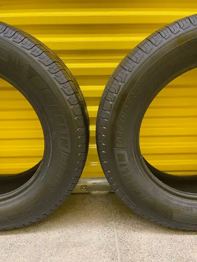 Pair. 225/65R17 102H Michelin Defender T+H. FIRM $170: Two Used All Seasons Tires. FIRM Tires Tread...