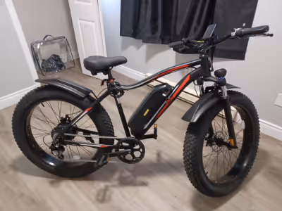E mountain bike, only been charged once,sand/snow tires its a xl frame ,must be at least 510"tall. 7...