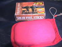 World Famous Felt Pocket Heater with Fuel Sticks (Collectible)