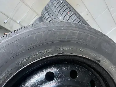 Winter Tires - (4) Four Michelin 205/65 R16 on Steel Rims. Bolt pattern 5x114.3 Two tires’ tread are...