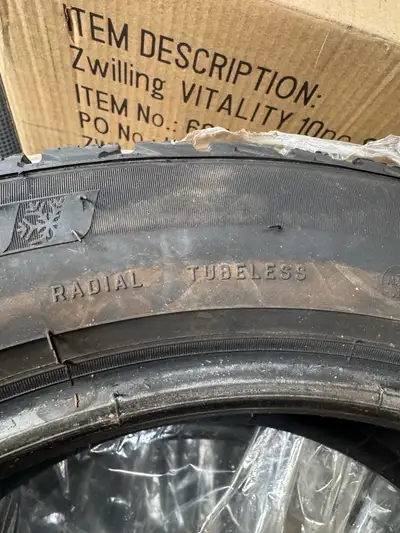 Two tires 98% new, two tires used for two seasons.