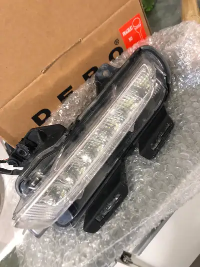 Chevy Cruze driving lamp Passenger size OBO $600 brand new for both will take $50.00 off I had to or...
