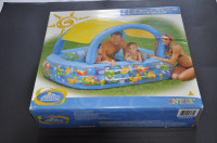 Inflatable pool with sun shade
