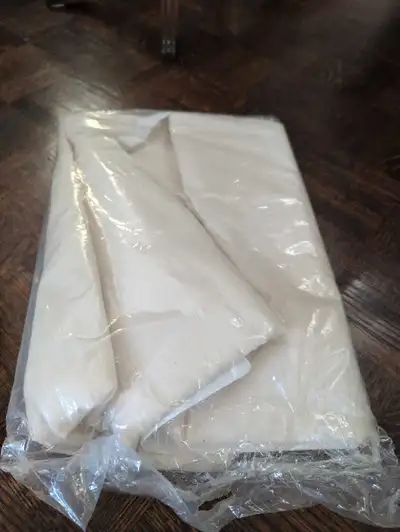 This is a brand new Truly ironing board cover, designed to fit standard ironing boards and provide a...