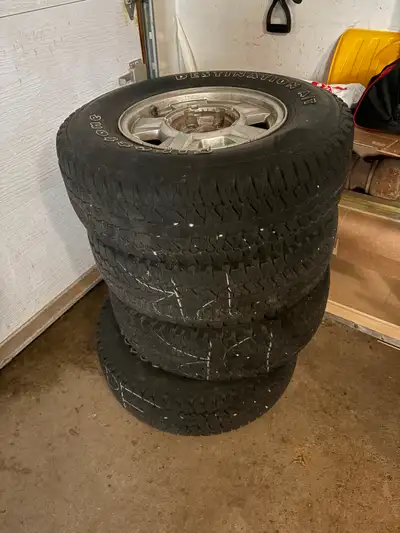 Firestone Destination A/T tires, 235/75R15 on GMC rims from GMC Canyon