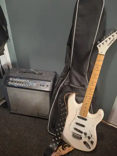 Beginner electric with amp . Great for starting out. Amp has duel inputs .