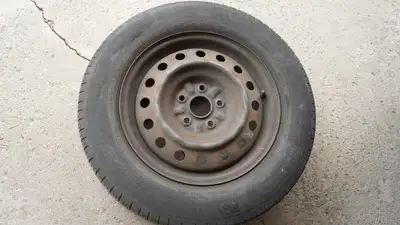 A set of 4 Michelin Radial X summer tires with rims, used for 2 Summers. 215/65/R16. Cash and carry....