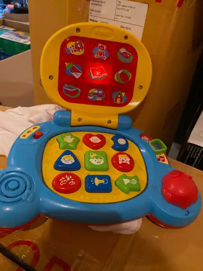 Vtech baby’s learning laptop works fine with lights and fun learning colours and shapes.