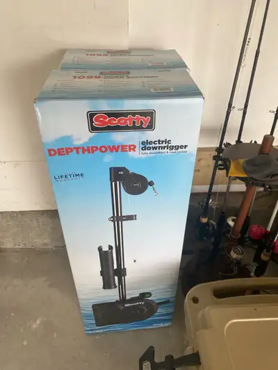 Pair of Scotty 1099 24” Downriggers. Brand new in box, never opened or used. Pair of weight retrieve...