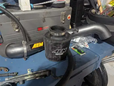 Upgrade your Acura RSX Type S (2002-2006) with this used AEM Cold Air Intake system, designed for en...