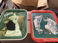 Collectable Coca Cola trays and coasters.