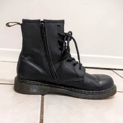 Doc Martens genuine leather boots with side zipper. Excellent condition, well maintained with condit...