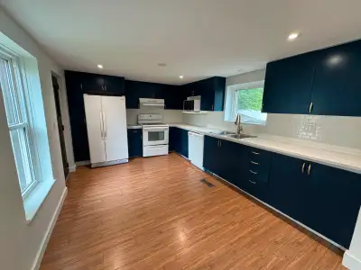 Oversized 4-Bed Home with Private Patio in Downtown Moncton