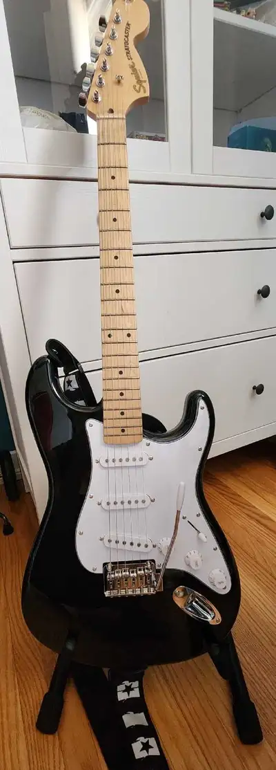Squier Stratocaster by Fender electric guitar, View more