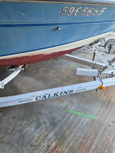 Trailer is a tandem 1100 pound easy load Trailer for a 20 foot boat Boat is a Chevy 6 cylinder Chevy...