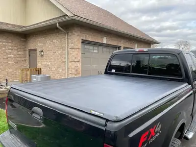 Used Xtang-Tri Fold Truck Bed Cover off of a 7 Ft Bed 2006 Ford F250