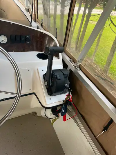 50hp BRP Evinrude outboard long shaft motor with power trim . Also comes with cables and controller....
