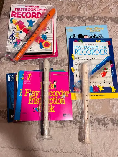 Picture 2, 3 and 4: Like new Yamaha recorder and three recorder books, including First Book of the R...