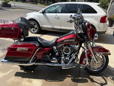 I'm selling a used 2007 Harley-Davidson Electra Glide, a touring motorcycle with a powerful engine a...