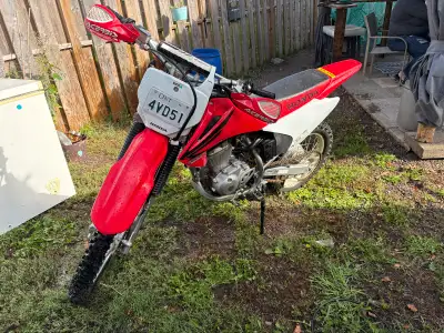 In really good condition and runs great , electric start , and big wheel model